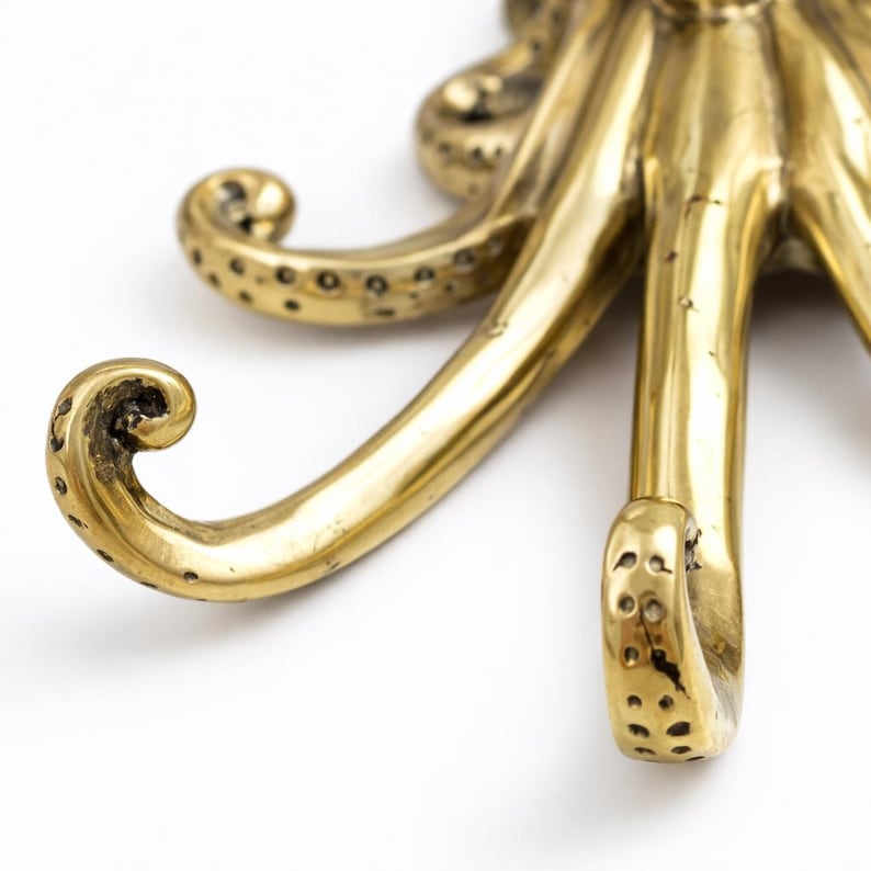 Brass octopus tentacle hook detail, decorative kraken wall hook nautical brass craftsmanship
