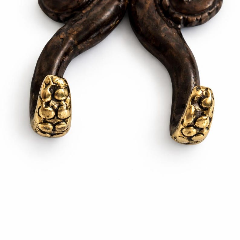 Close-up detail of octopus hook tentacles used for hanging coats towels or keys