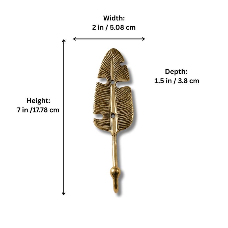 Size chart for brass banana leaf hook showing height 7 inches 17.78 cm, width 2 inches 5.08 cm, and depth 1.5 inches 3.8 cm