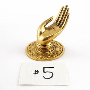 Messing badjashaak en handdoekhaak – Boeddha mudra handsculptuur #5, badkamerbeslag spa (links/rechts)