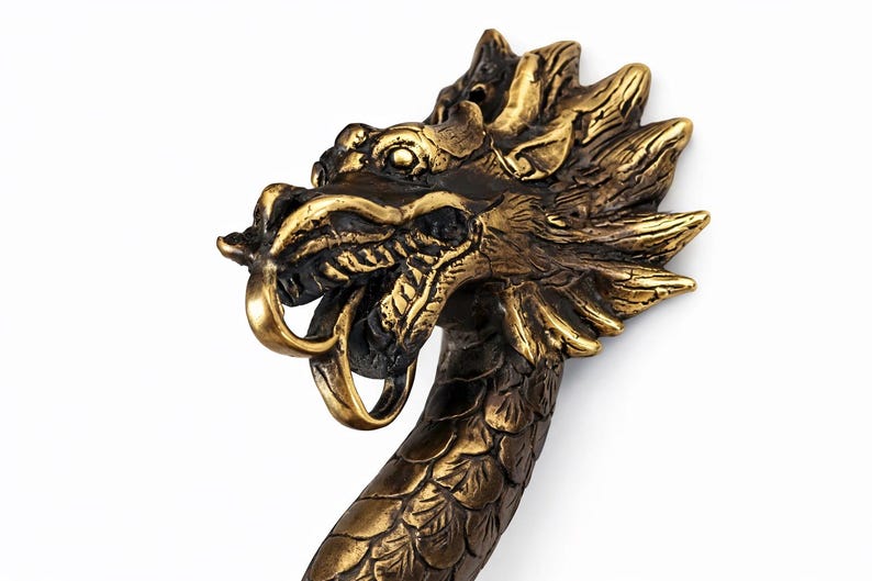 Close up dragon head detail solid brass dragon door handle sculpture