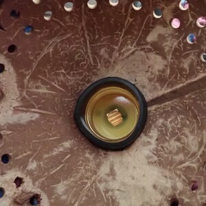 Inside coconut shell lamp with bulb, handmade coconut lighting structure detail