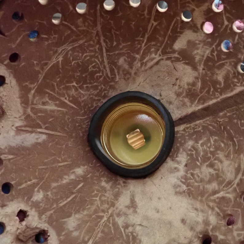 Inside coconut shell lamp with bulb, handmade coconut lighting structure detail