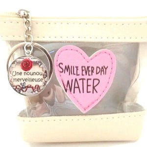Porte monnaies ou porte cartes + anneau porte clés, "Une nounou merveilleuse",cadeau nounou, inscription "Smile ever day water"