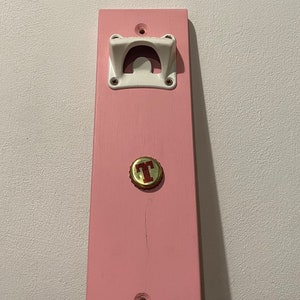 Wall-mounted wooden bottle opener with magnetic stopper