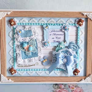 PROMO Exceptionnelle  Cadre/Vitrine /tableau   bébé garçon (sans vitre vu les épaisseurs) mini layettes  Pièce Unique.  27CMX21CMX1,5CM