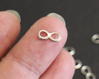 6 Infinity Charms aus silbernem Edelstahl 10 x 4 mm