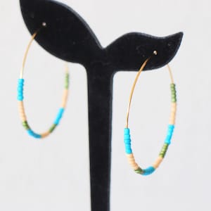 Stainless steel hoop earrings with multi-colored seed beads, blue, beige and khaki, handmade