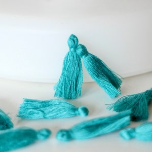 10 petrol blue cotton pom poms 30 mm