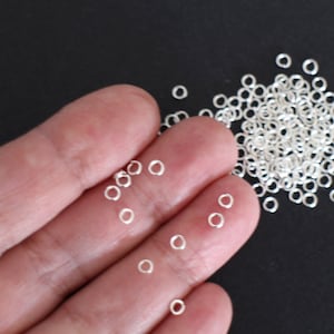 200 anelli rotondi aperti in metallo argentato 3 mm