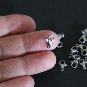 6 fermagli a moschettone in acciaio inox argentato 10 x 6 mm