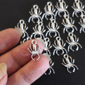 10 silver metal spider charms 18 x 13 mm