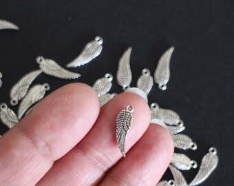10 breloques petites ailes identiques des deux côtés en laiton argenté 17 x 5 mm pour vos créations bijoux style nature