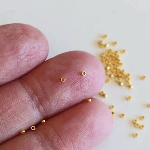 100 petites perles à écraser en Acier inoxydable or 1,5 mm