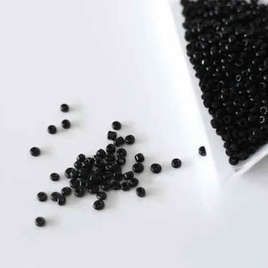 Perline di vetro nero rotonde da 2 mm