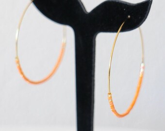 Handmade stainless steel hoop earrings with small Miyuki beads