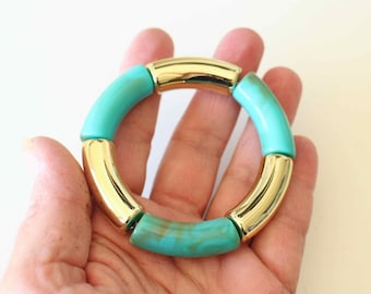 un bracelet en perles tube incurvées en acrylique vert et or Fait-main un seul disponible