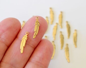 6 finely crafted golden stainless steel feather charms 17 x 4.5 mm for your nature style jewelry creations