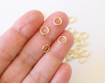 20 anelli aperti rotondi in acciaio inossidabile placcato oro, 8 mm