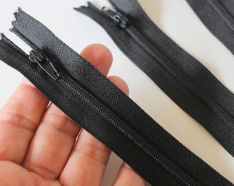 Zipper black zipper 23.5 cm x 27 mm