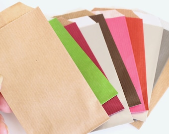 10 sacchetti regalo rettangolari in carta di diversi colori 13 x 7 cm per proporre i tuoi regali in modo unico ed ecologico