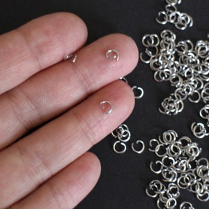 50 anneaux de jonction ronds ouverts en acier inoxydable argent 5 mm apprêts pour vos créations bijoux image 1