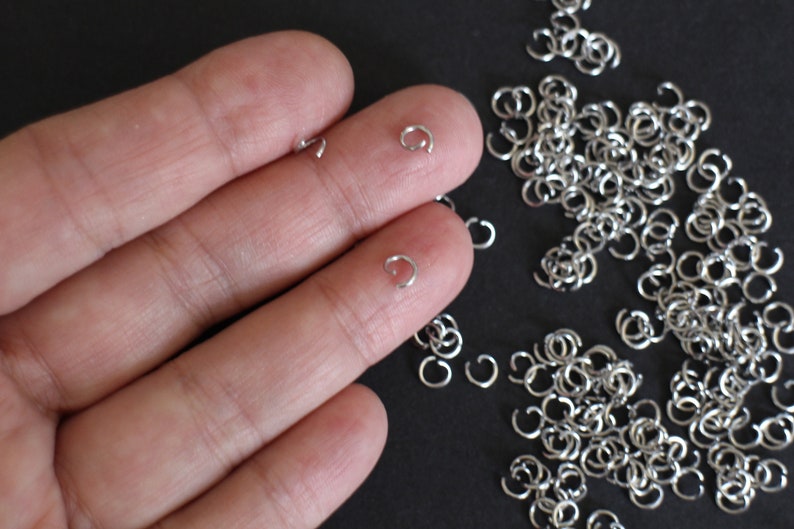 50 anneaux de jonction ronds ouverts en acier inoxydable argent 5 mm apprêts pour vos créations bijoux image 1
