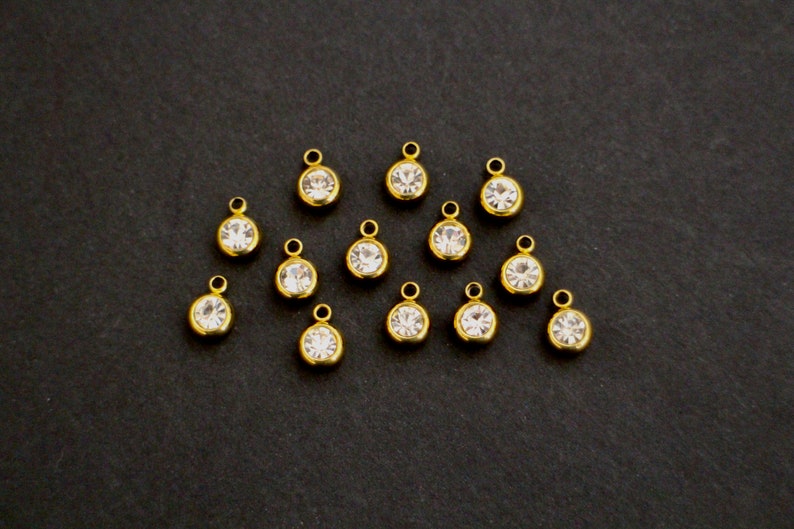 10 breloques strass ronds en acier inoxydable doré 8 x 6 mm pour des créations bijoux épurées et glamour zdjęcie 2