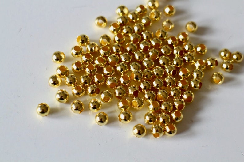 Perles intercalaires rondes lisses en laiton doré perles d'entretoises de différentes dimensions au choix 2mm, 3mm, 4mm, 5mm, 6mm ,8mm 3 mm / 100 perles