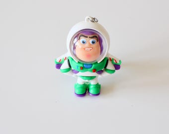 Llavero de Buzz Lightyear de Toy Story en acero inoxidable plateado, hecho a mano.