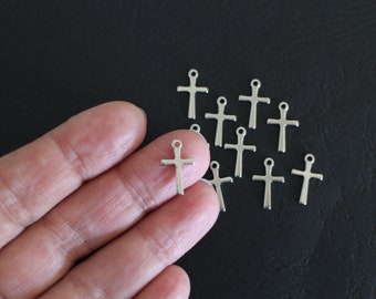 10 silver stainless steel cross charms 15 x 10 mm for your jewelry creations on religious or trendy themes