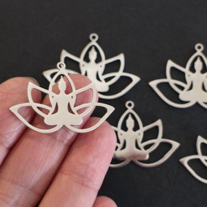 A large Yoga pendant print in a finely crafted lotus flower in silver stainless steel 36.5 x 25 mm for Zen jewelry creations