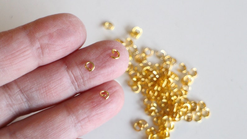 50 anillas abiertas redondas de acero inoxidable chapado en oro, 4 mm imagen 1