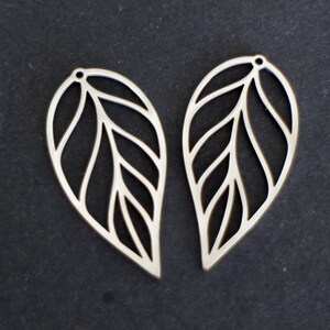 A chiseled leaf charm pendant in silver stainless steel 42 x 21 mm for nature jewelry creations image 2