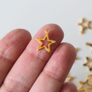 10 hollowed-out star charms in golden stainless steel 15 x 13 mm for timeless jewelry creations image 1