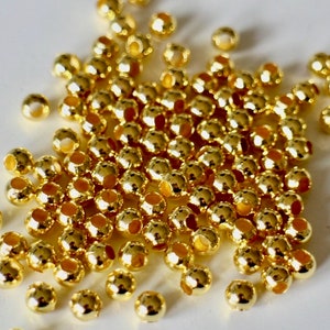 Perles intercalaires rondes lisses en laiton doré perles d'entretoises de différentes dimensions au choix 2mm, 3mm, 4mm, 5mm, 6mm ,8mm 4 mm / 50 perles
