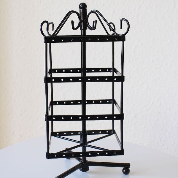 Large rotating display holder for black metal earrings