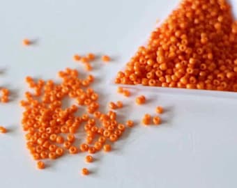 Orange round glass seed beads 2 mm