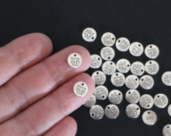 10 small round charms engraved with lotus flowers on one side 8 mm for your jewelry creations in the Zen universe
