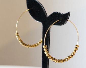 Gold stainless steel hoop earrings and gold faceted glass beads Handmade, gift packaging is offered to you