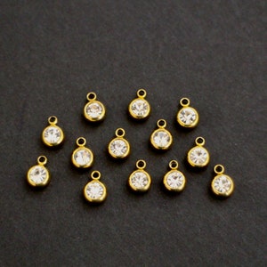 10 breloques strass ronds en acier inoxydable doré 8 x 6 mm pour des créations bijoux épurées et glamour zdjęcie 6