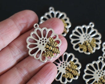 10 flower and bee charms in silver and gold brass 33 x 29 mm