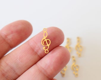 2 musical note connectors chiseled treble clefs in gold stainless steel 18.5 x 7 mm