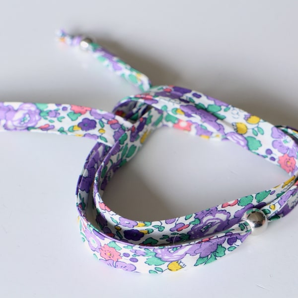 A bracelet to tie in authentic purple and multi-colored Liberty with silver acrylic bead Handmade in free gift packaging