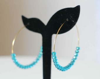 Gold stainless steel hoop earrings and peacock blue beads Handmade