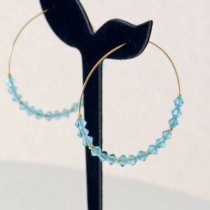 Gold stainless steel hoop earrings with sky blue pearls - Handmade