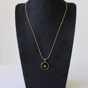 Handmade stainless steel gold and black enamel North Star necklace