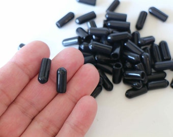 20 embouts forme tubes en silicone noir 15 x 5,5 mm c'est l'apprêt idéal pour en finir avec le mal aux oreilles avec vos serre-têtes