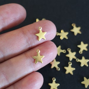 10 star charms in gold stainless steel 10 x 8 mm image 1