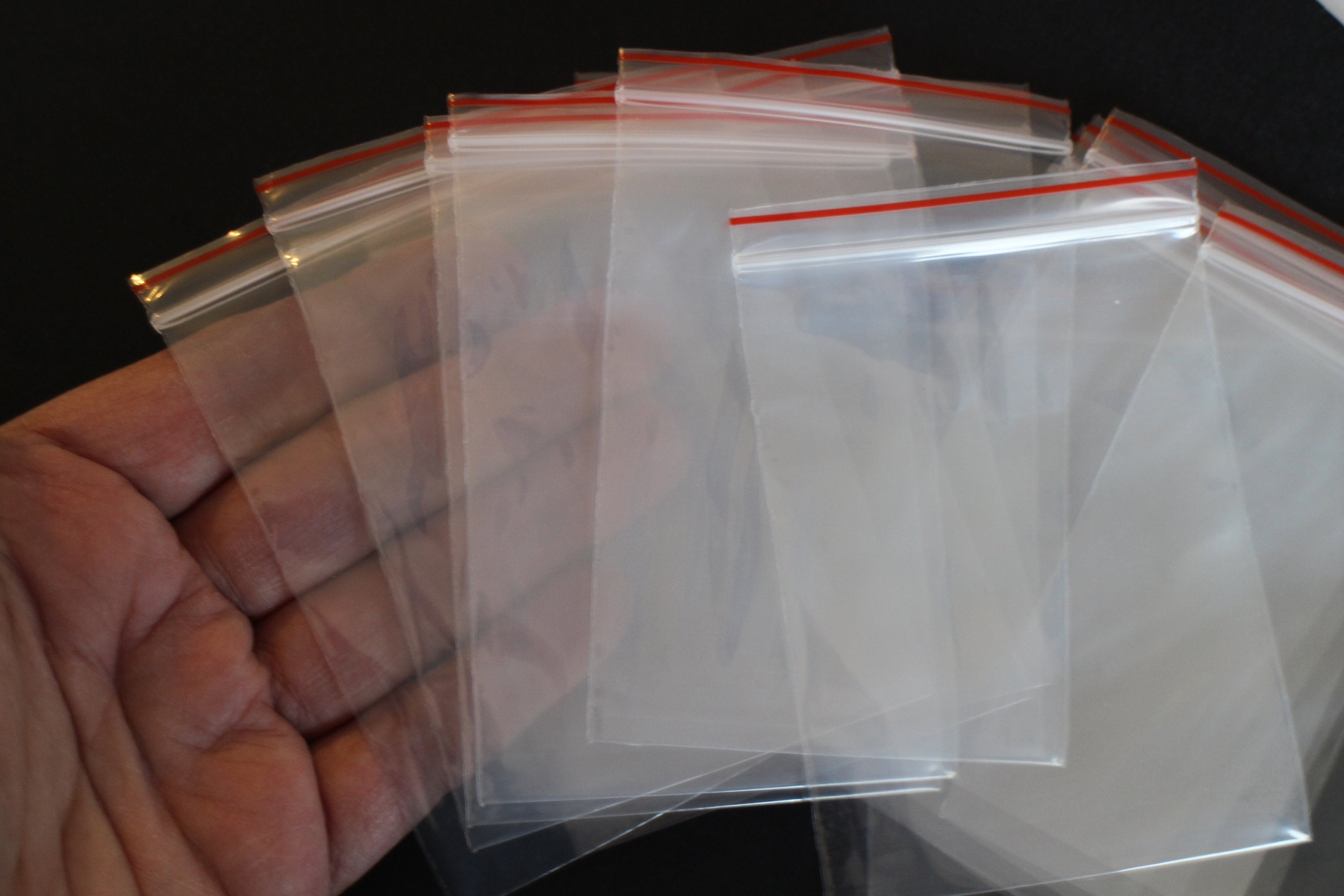 10 sachets confiseur transparent avec clips 11,5 x 19 cm - Zischka